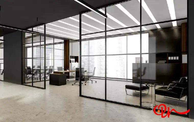 پارتیشن شیشه‌ای مشهد با قاب فلزی مشکی و مبلمان اداری مشکی